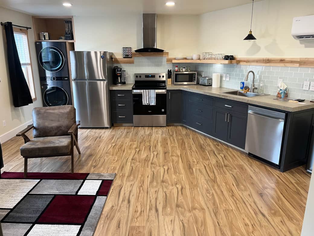 Looking at the end of the unit and the kitchen layout. More changes still coming.