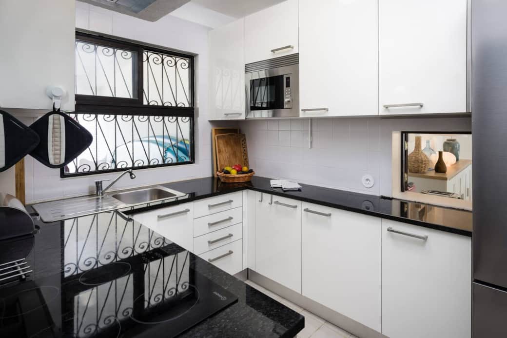 Fully equipped kitchen with an induction stove and oven Fully equipped kitchen with an induction stove and oven