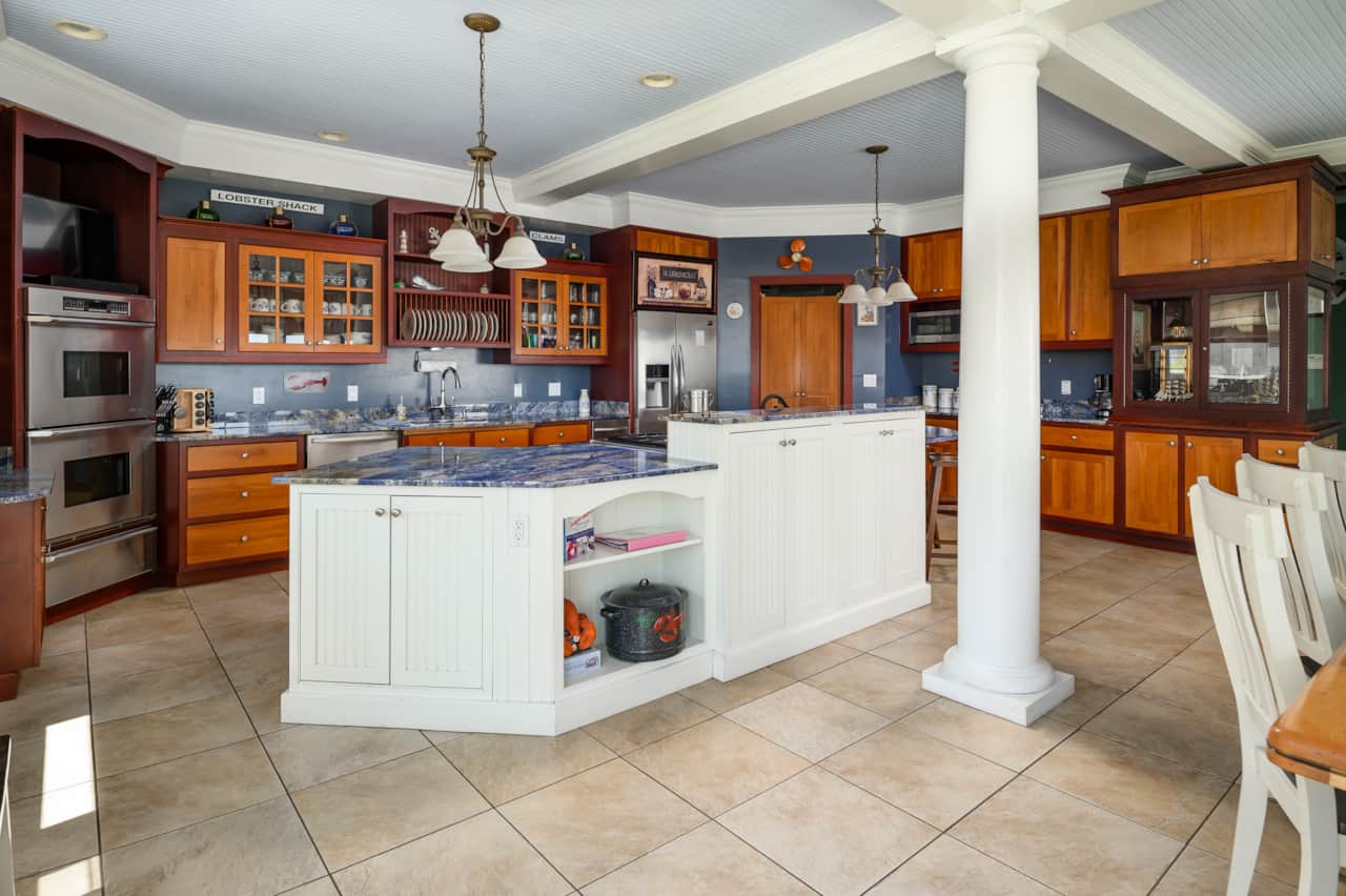 Open concept kitchen with adjacent dining area