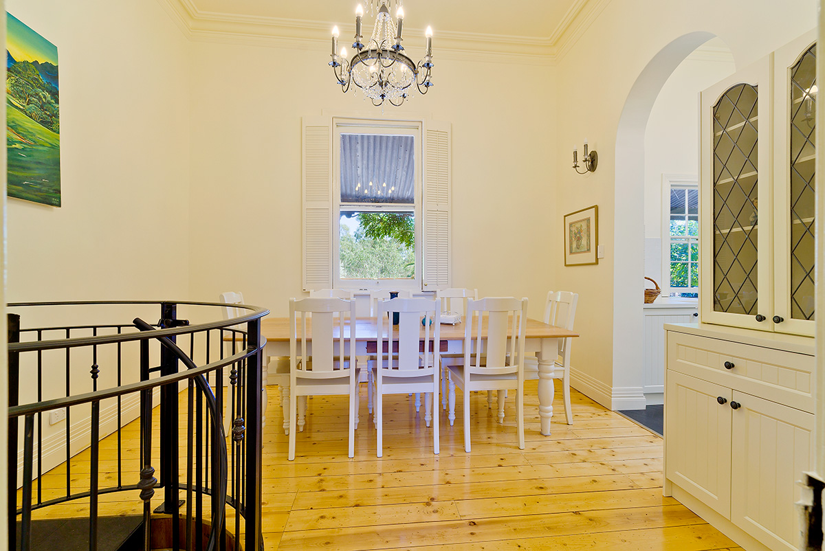 Safety railed staircase downstairs to pool