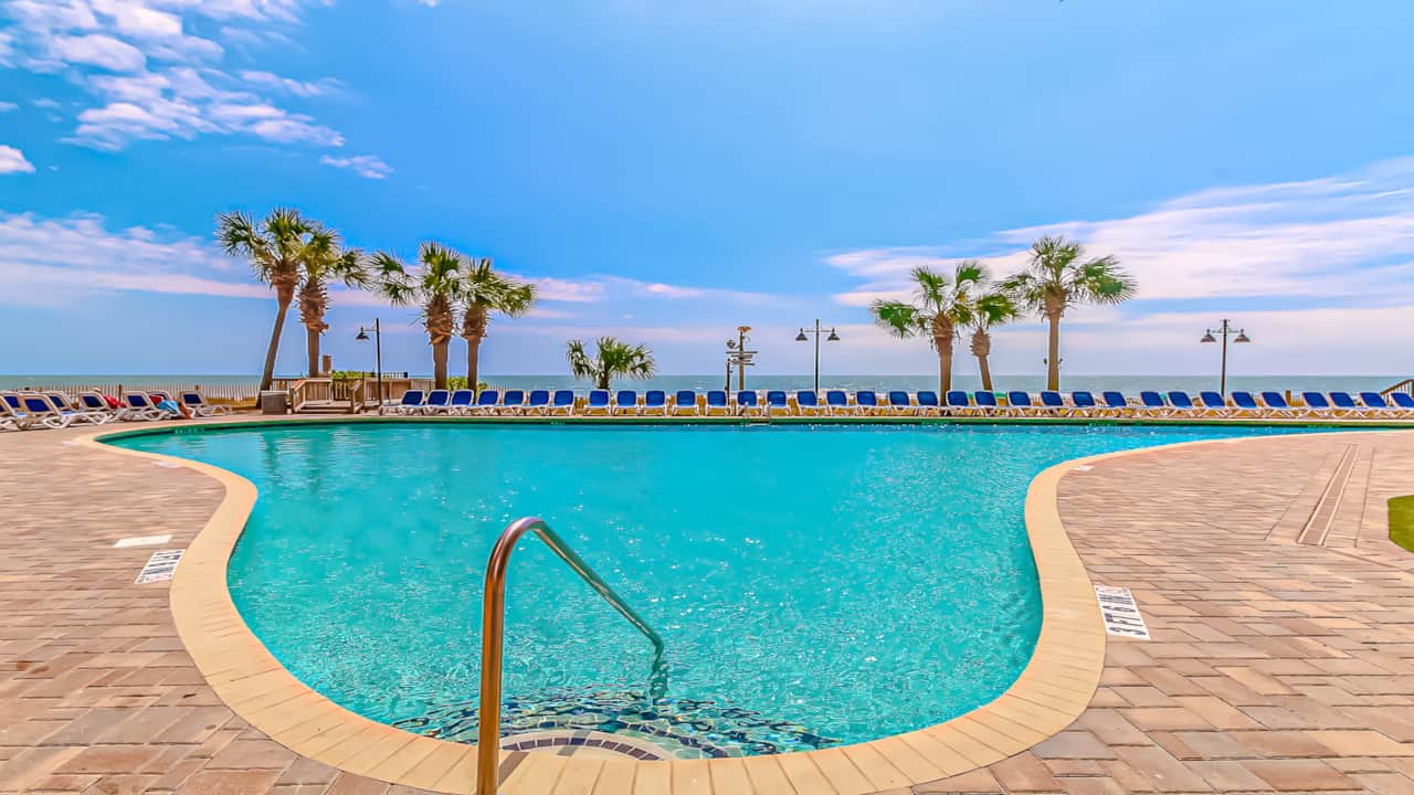 Outdoor pool overlooking the beach—just steps from the sand.