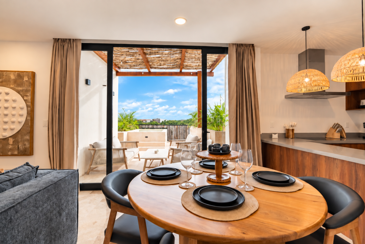 Dining area with Tulum jungle views overlooking your private terrace and pool.