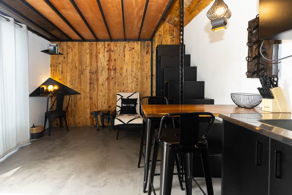 Minimalist wood-and-steel breakfast bar inside our nature cabin near Valle de Antón, Panama