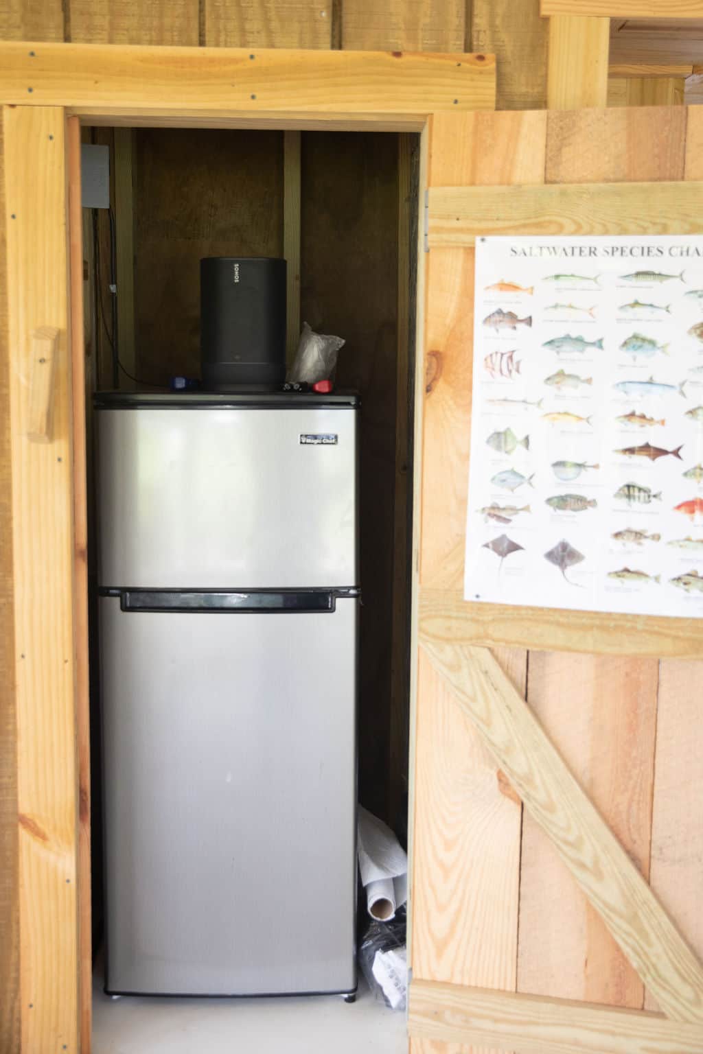 Small fridge outside near the water