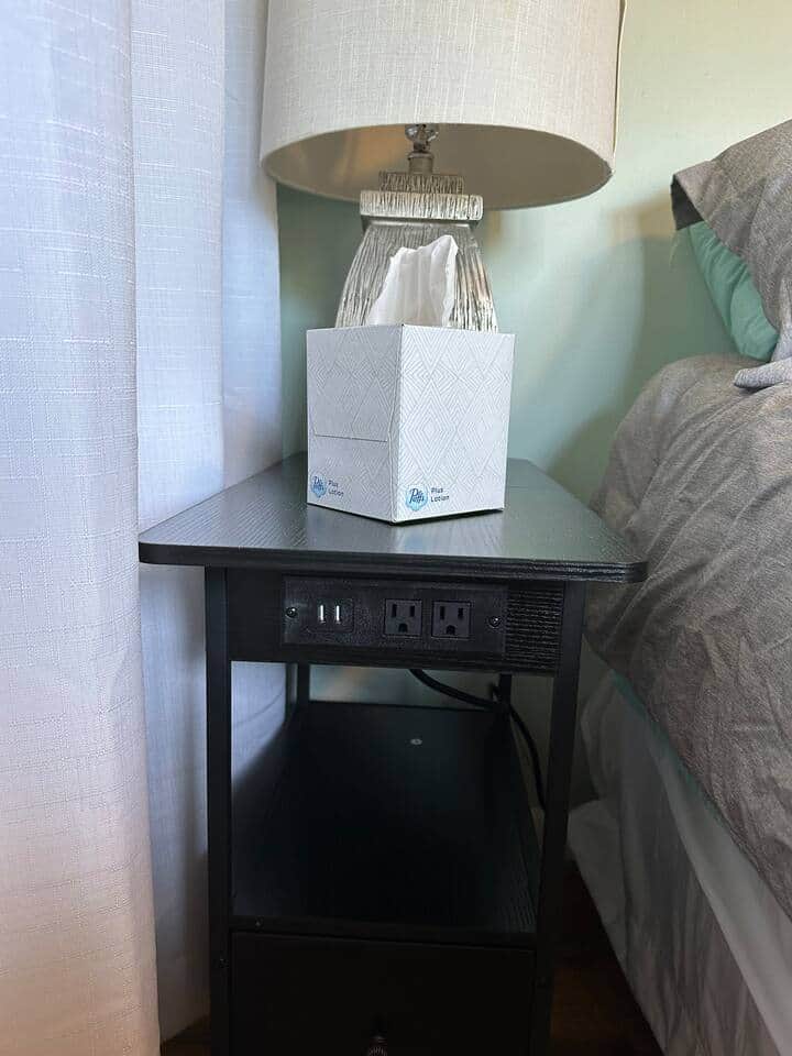 Nightstands with easily accessible built-in plugs for charging gadgets. Nightstands with easily accessible built-in plugs for charging gadgets.