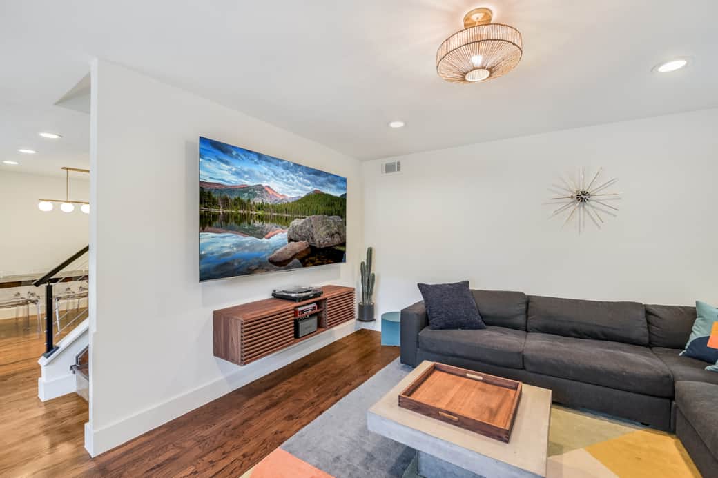 Tune in or rock out: Massive TV with turntable.