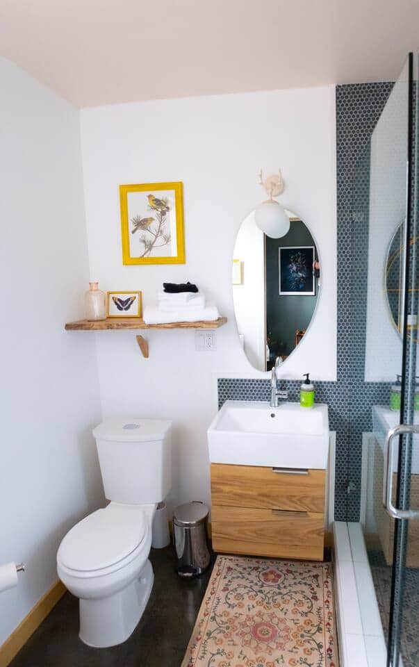 The beautifully appointed bath features luxury towels and essentials.