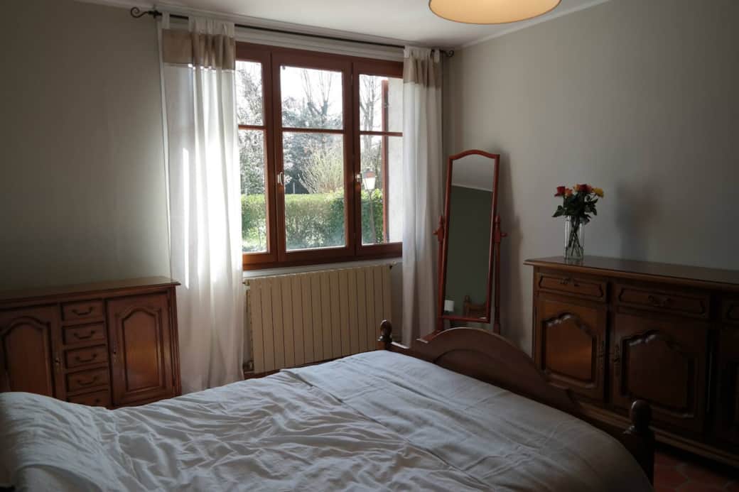 Bedroom 1 with queen bed and air conditioning