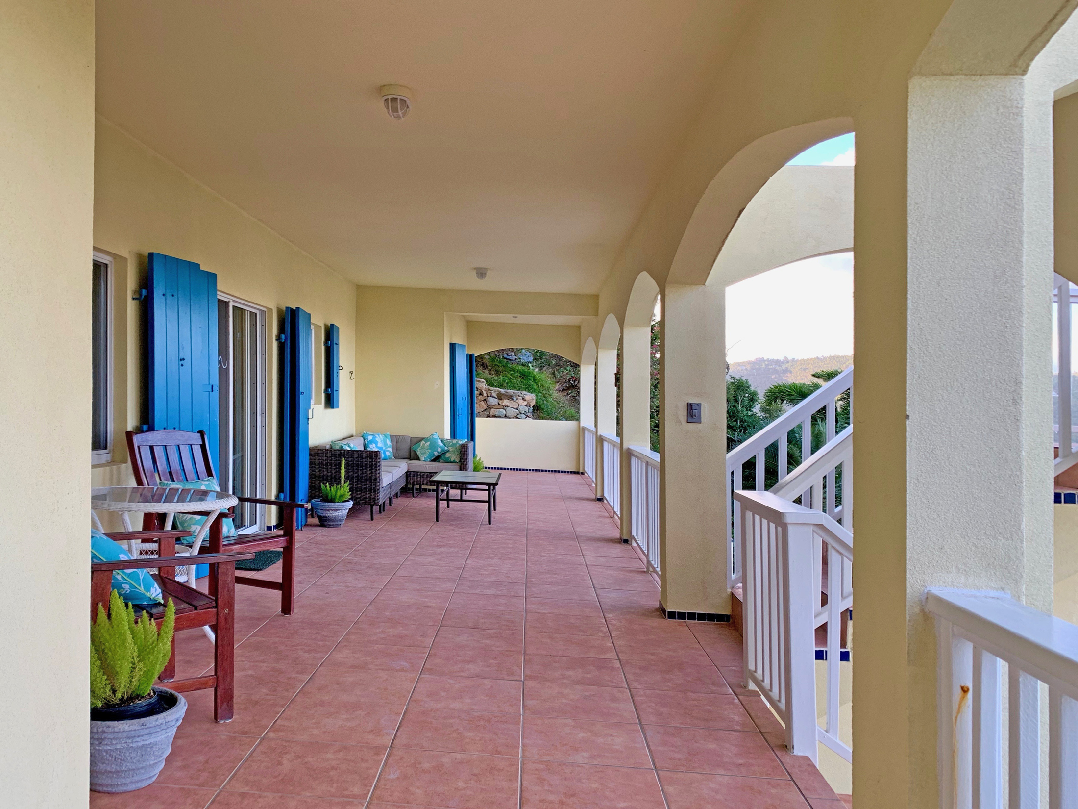 Mid level veranda and outdoor seating