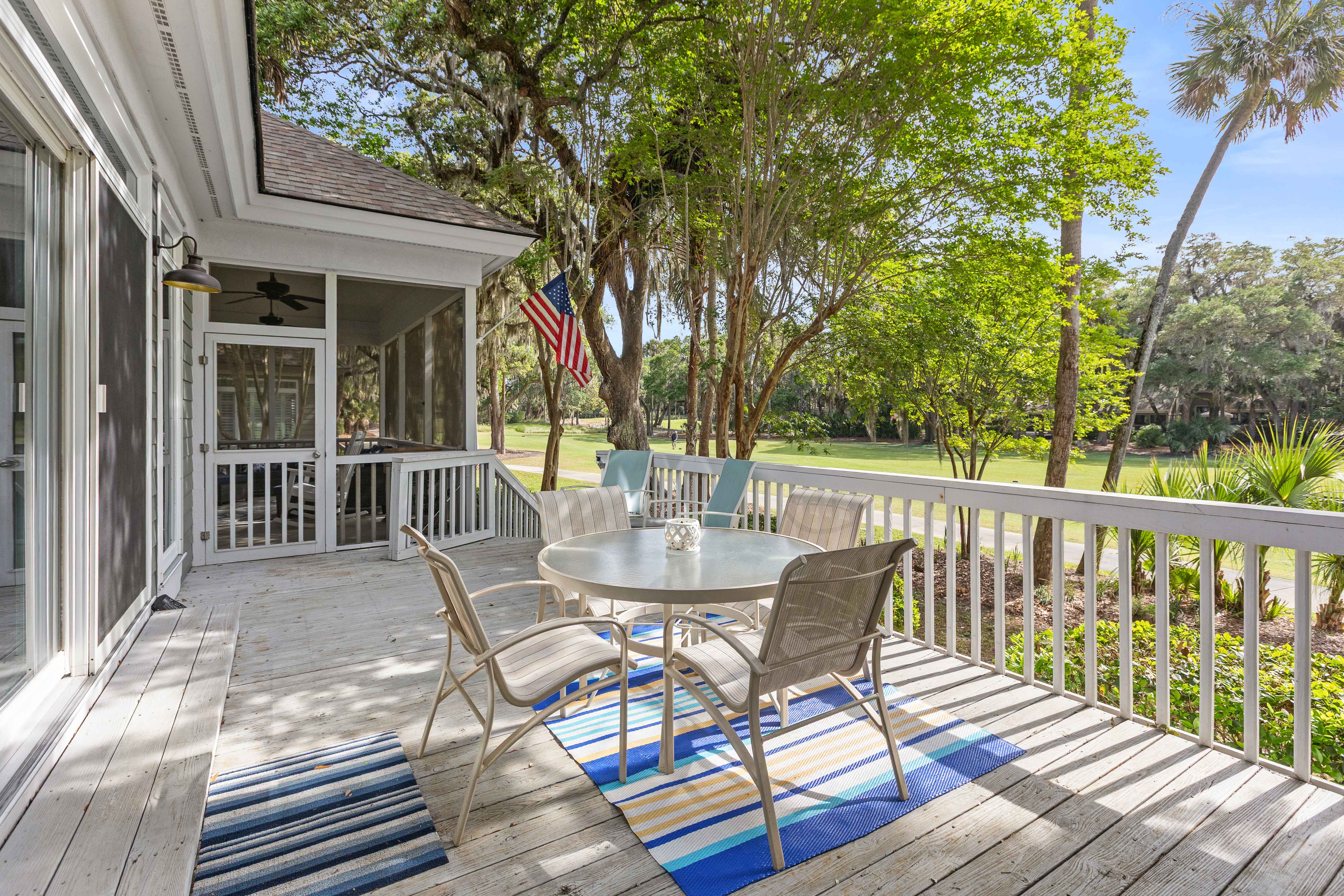 Open deck off the porch, dining table for four