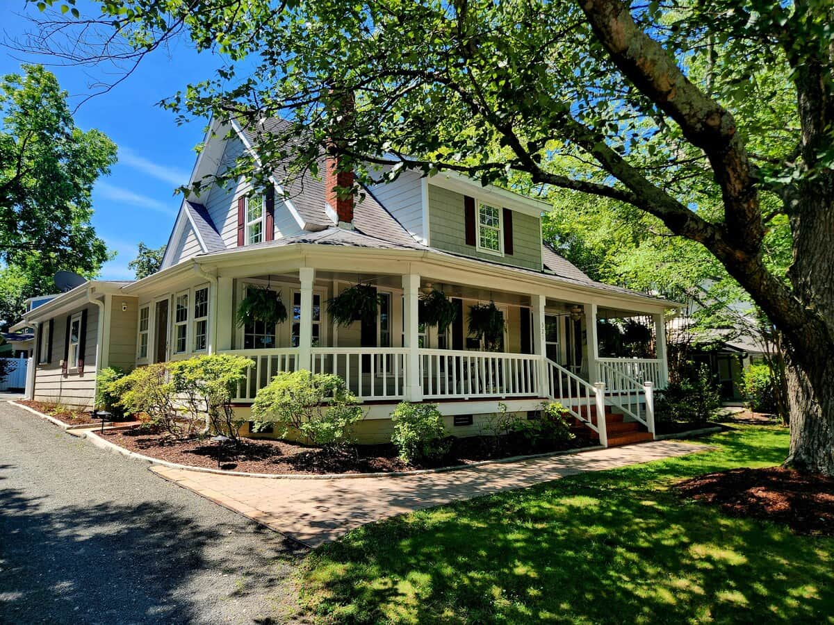 Next door to The Matthews House and walking distance to Chatham Station, this charming 1930s cottage welcomes you with vintage warmth and an unbeatable Downtown Cary location. Walk to Downtown Cary | Vintage Cottage | Porch Swing