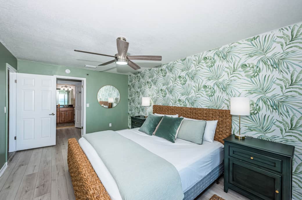 Master bedroom with king size bed and private bathroom