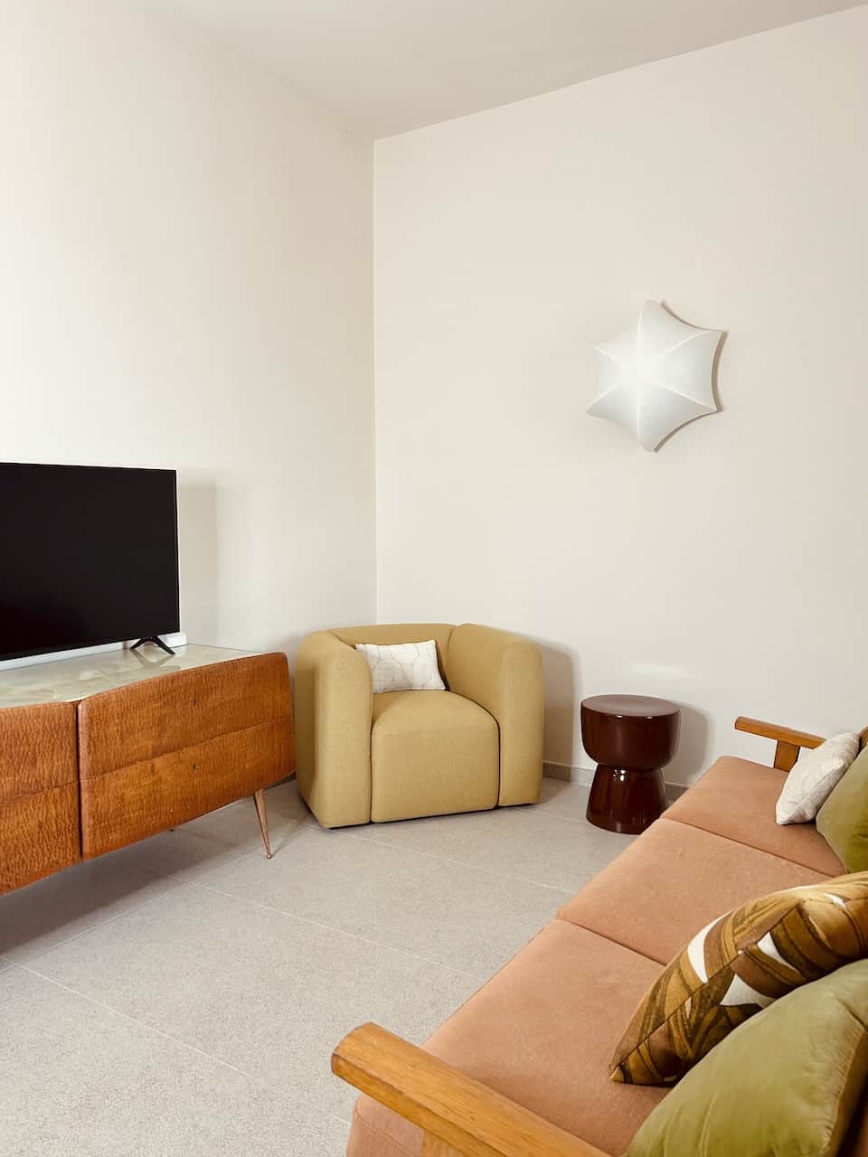 The living area with its rich textiles, is the perfect place to retreat after a day's sightseeing