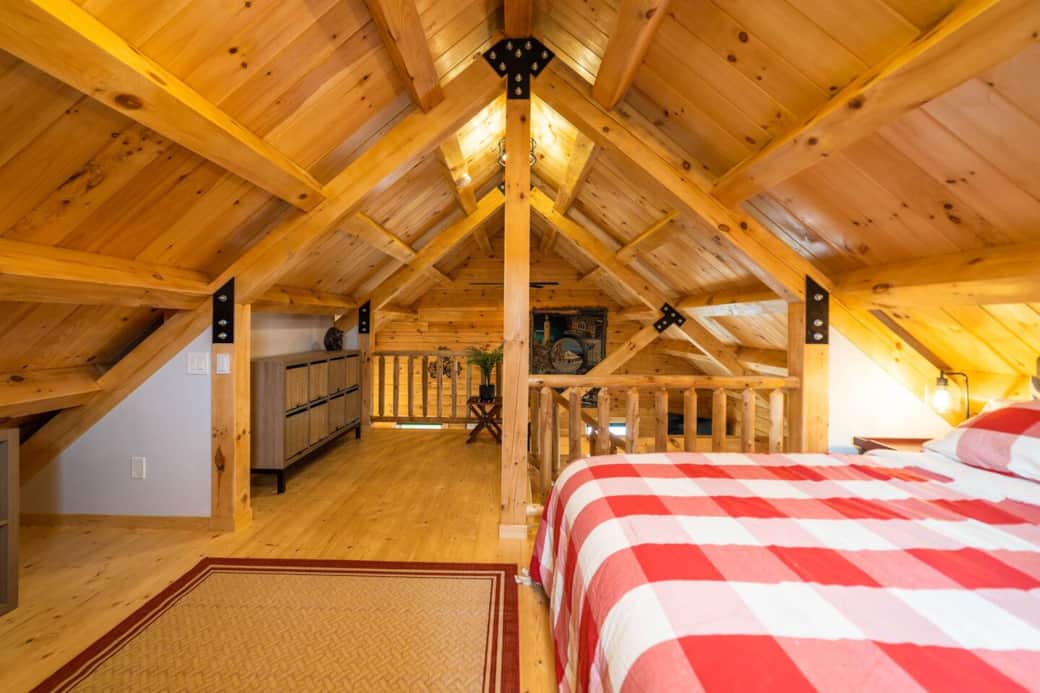 The loft has a king bed with a reading area. The window overlooks the highest peak of the Hoosac Mountain Range. The loft has a king bed with a reading area. The window overlooks the highest peak of the Hoosac Mountain Range.