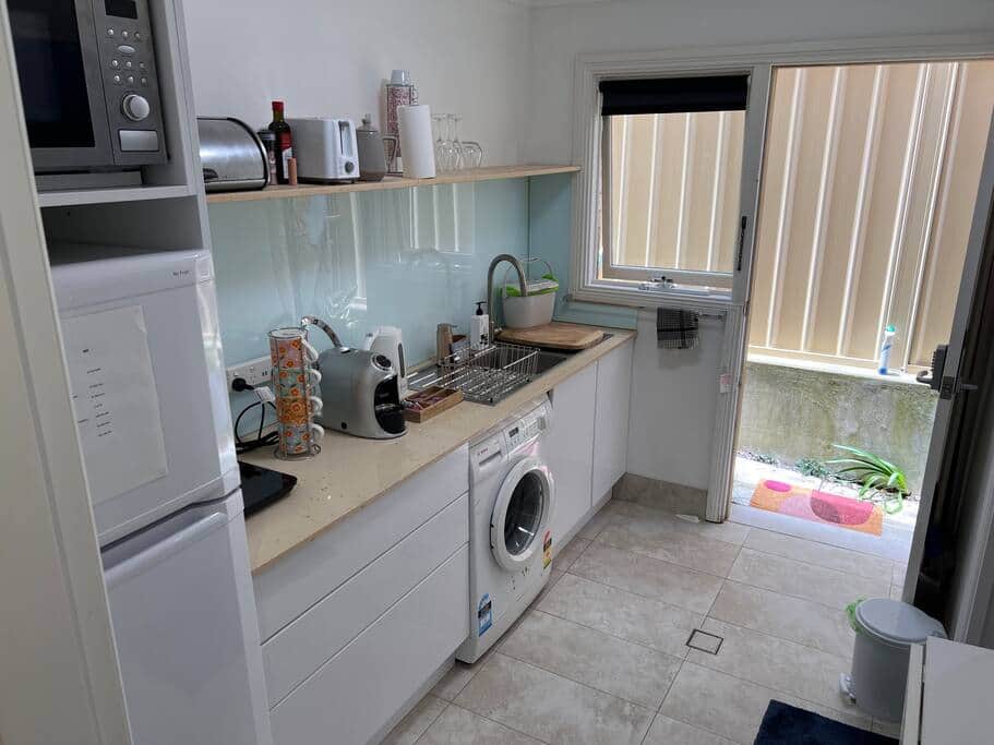 Kitchen and Private Entrance to the Studio including large Fridge and Washing Machine Kitchen and Private Entrance to the Studio including large Fridge and Washing Machine