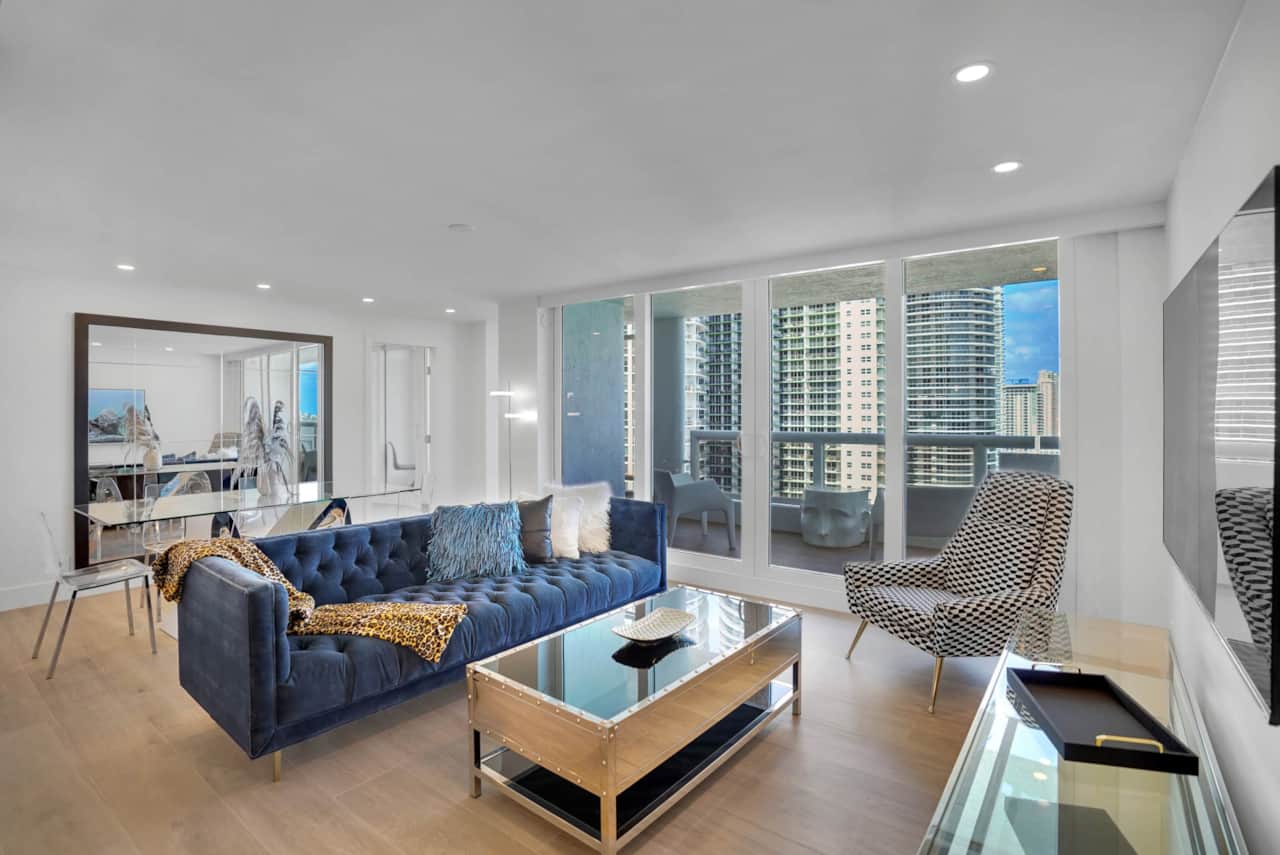 Living area, Roku streaming tv, dining area with seating for 6, balcony access
