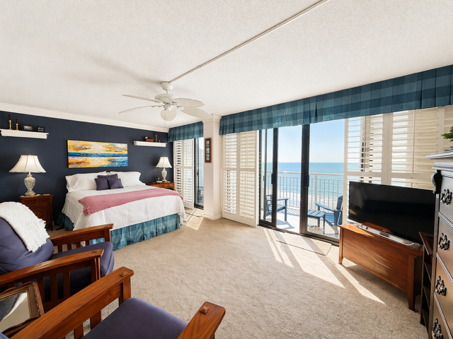 Primary bedroom expansive with queen