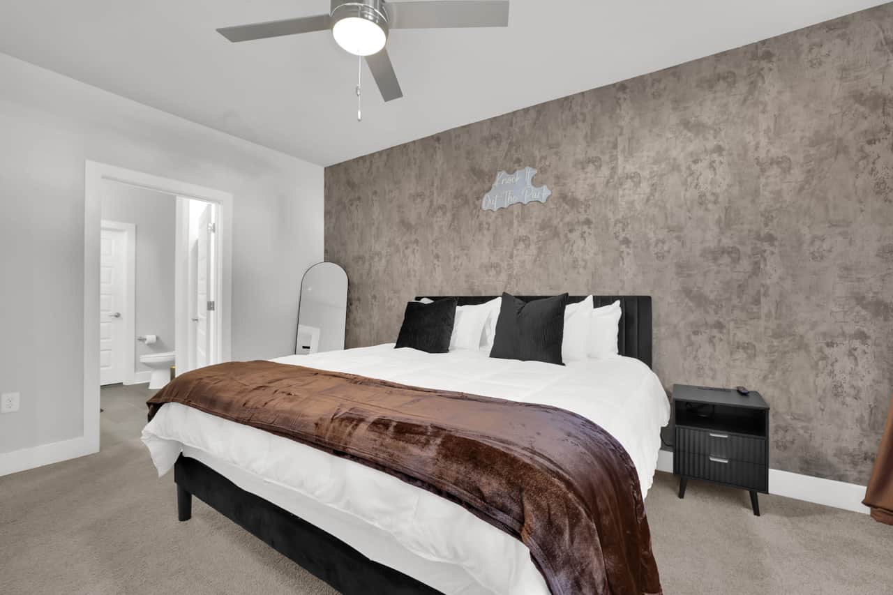 Large King Sized Bed in Primary Bedroom.