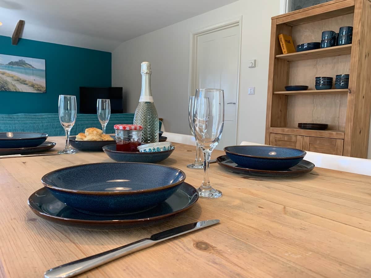Dining table with plenty of space to all sit down for a meal. 