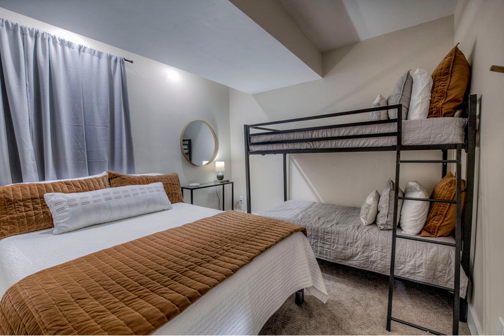 basement bedroom with queen bed and twin bunks basement bedroom with queen bed and twin bunks