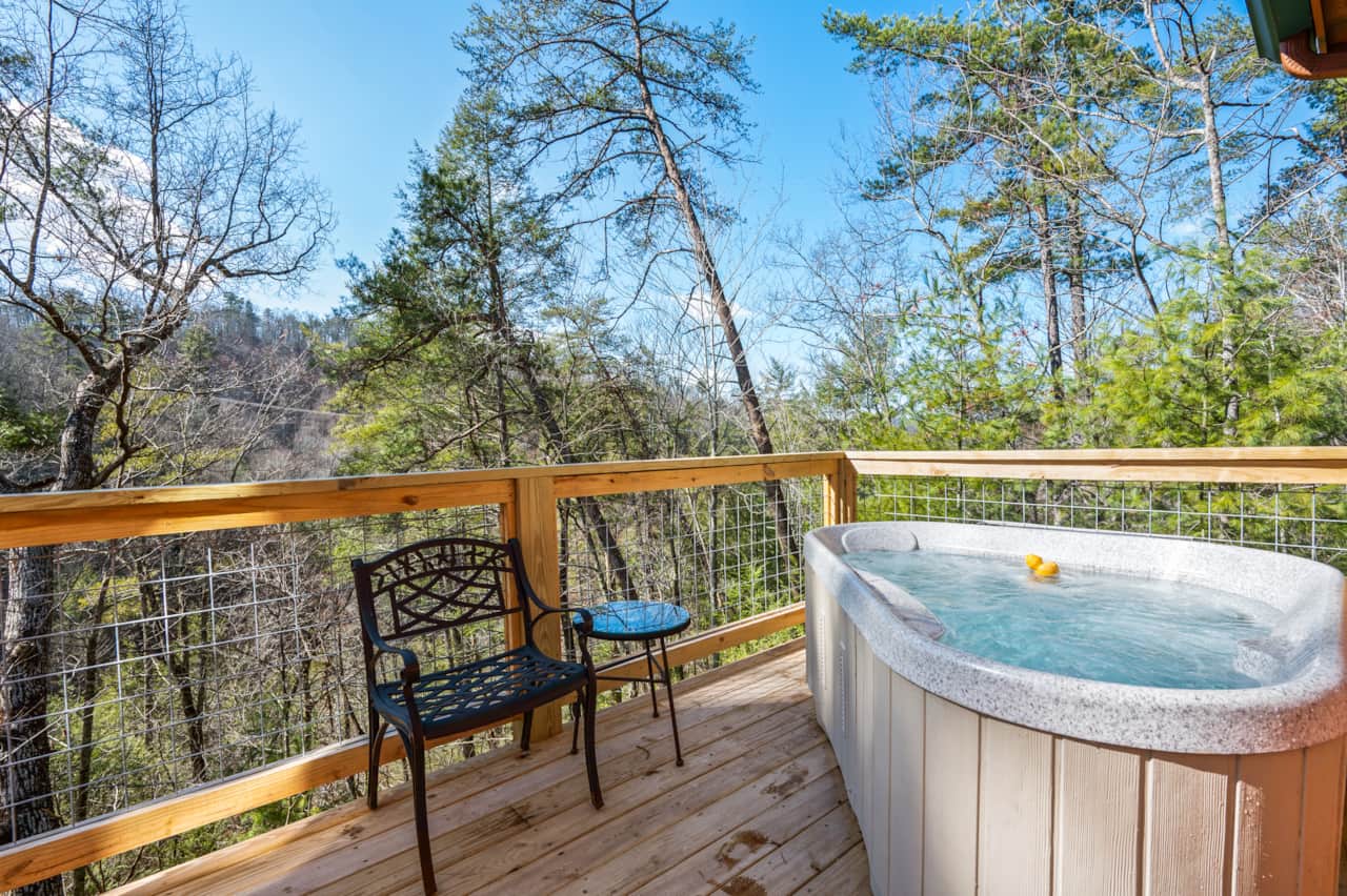 Relax in the 2 person hot tub, taking in the beautiful wooded views!