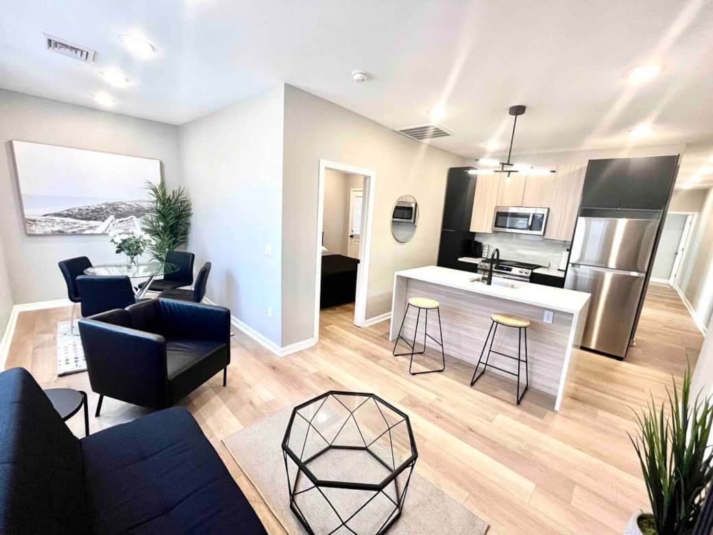 Brand new kitchen and appliances with breakfast bar, dishwasher ,microwave, refrigerator. 
Joined with the living room with futon sofa bed, large flat screen tv , fireplace and dining room. 