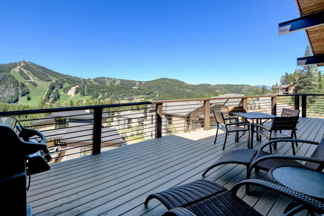 Huge upper deck with BBQ grill, dining table, lounge chairs
