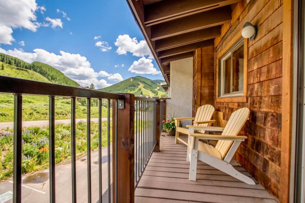 Adirondack chairs on the porch, thats the mountain vibe I love!