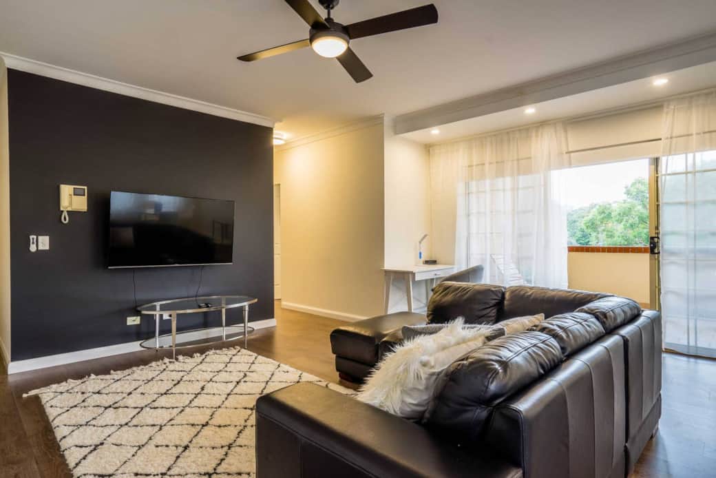 Smart TV, mini Bose sound system, phone charging lamp and wifi