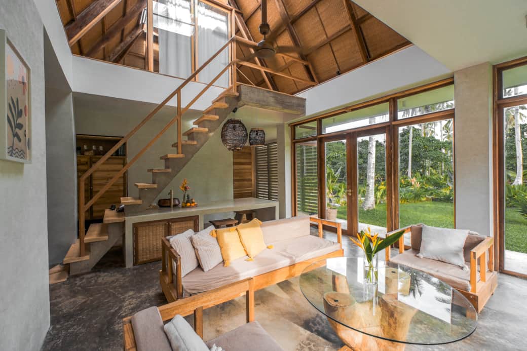 Set over two storeys, villa features upstairs master bedroom and downstairs living and dining area
