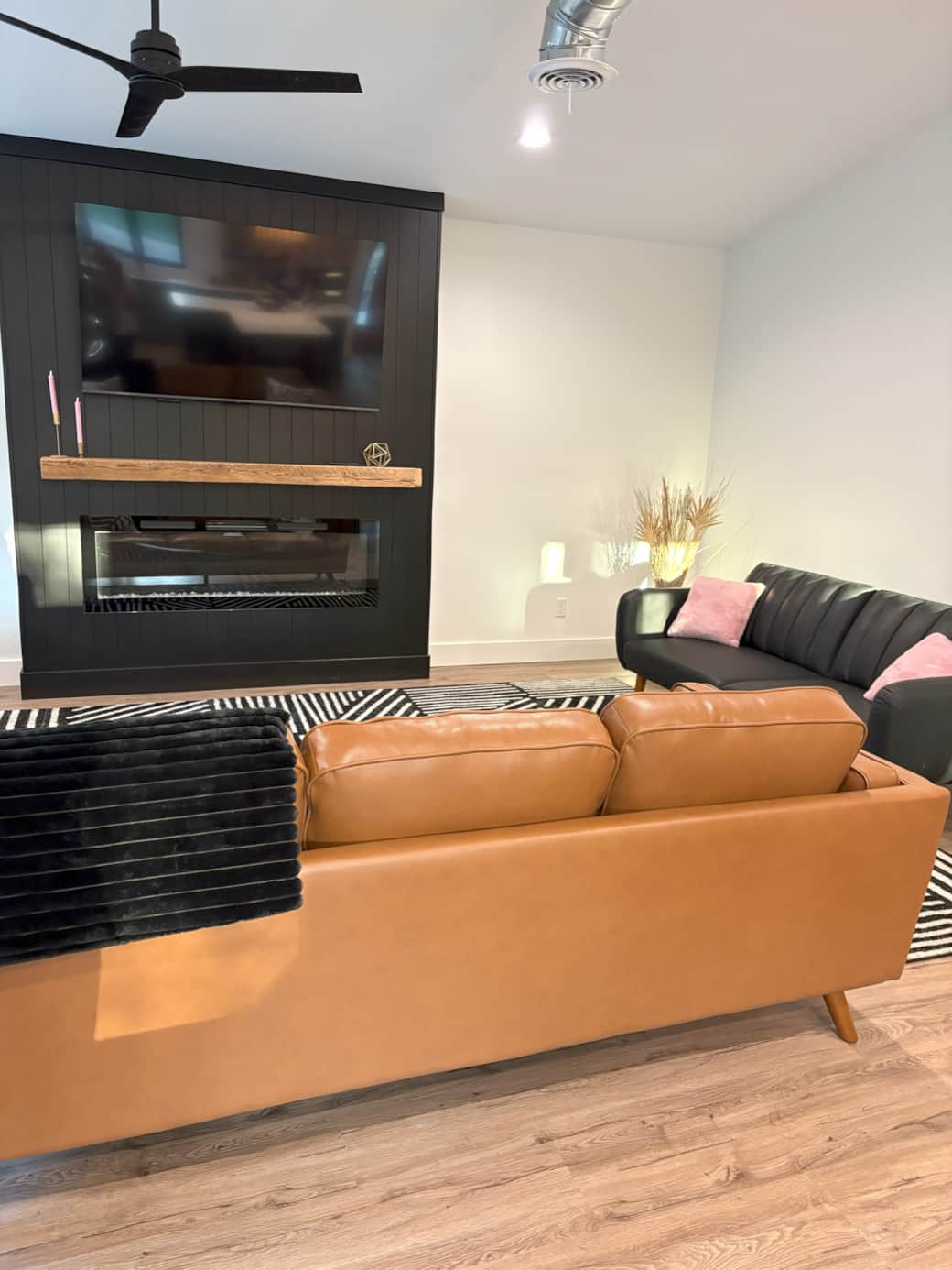 Sofa sleeper open concept living room with fireplace