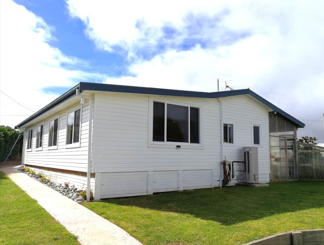 West end with lawn.