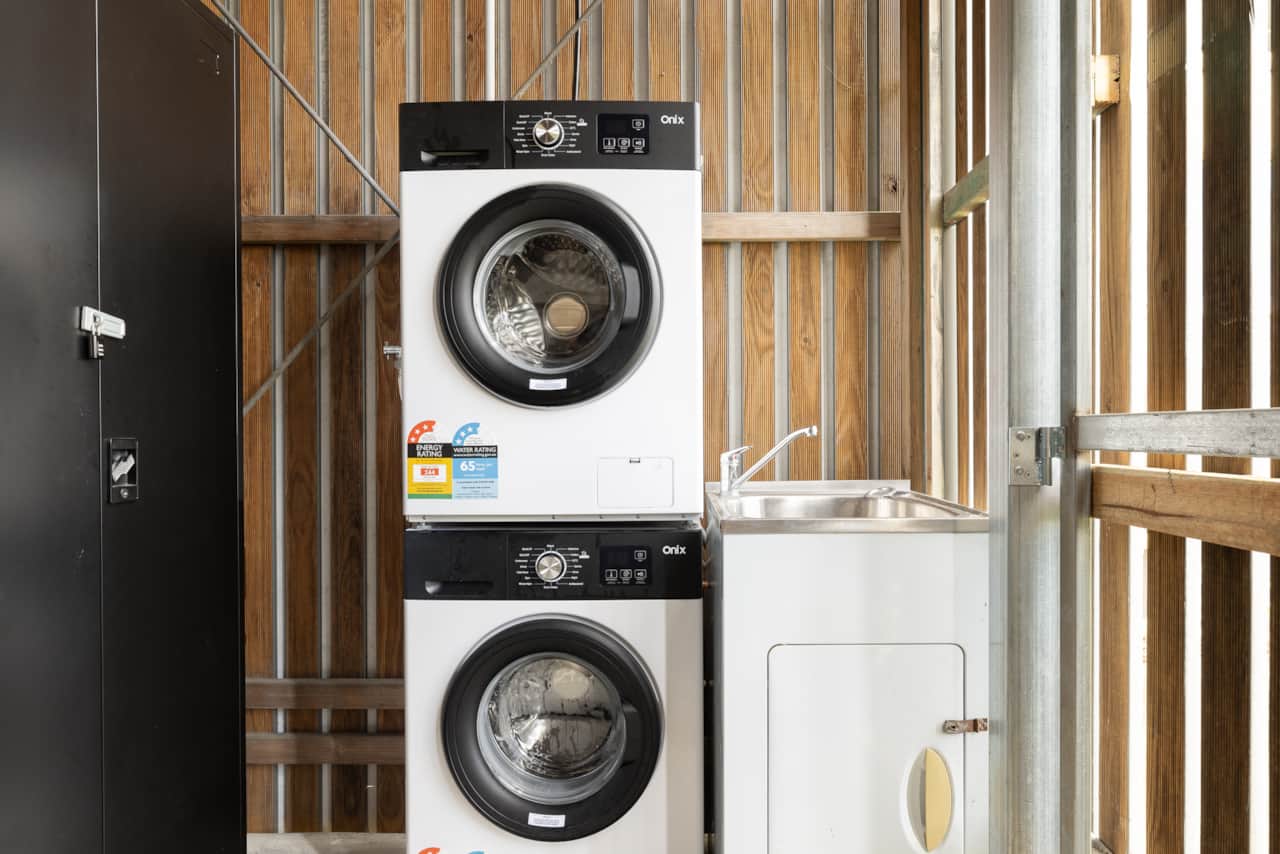 Shared Laundry Area: Washer available for convenient laundry needs 