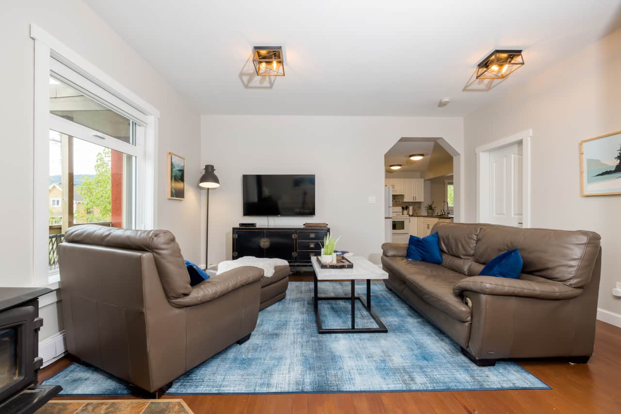 Suite E Large Living Room with Multiple Seating Areas