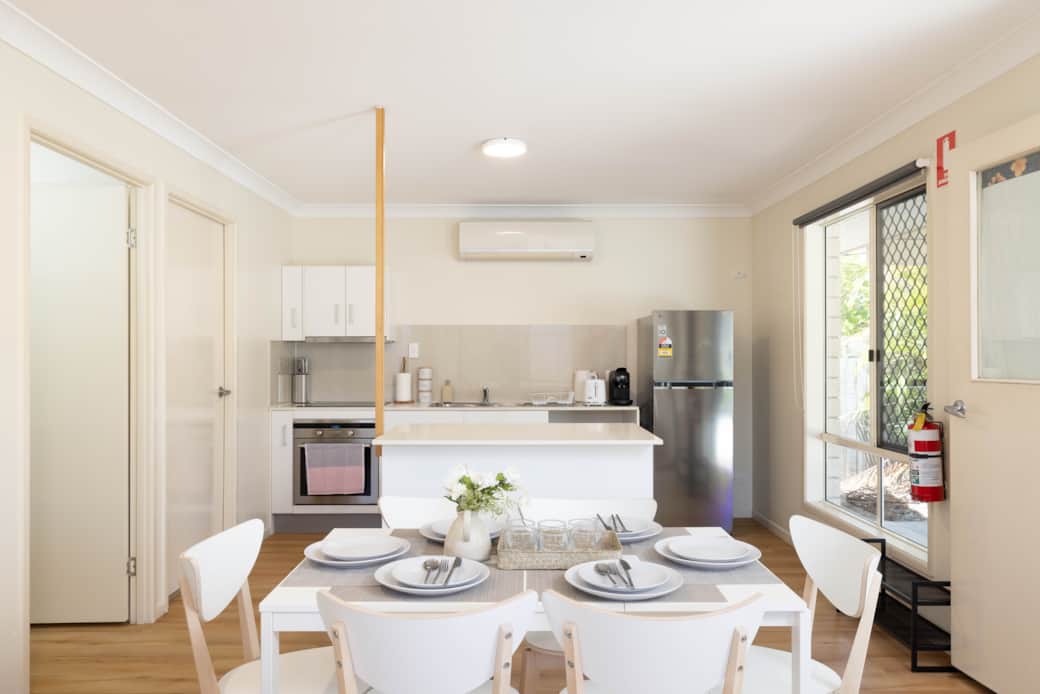 Dining Area: Integrated dining area within open living layout