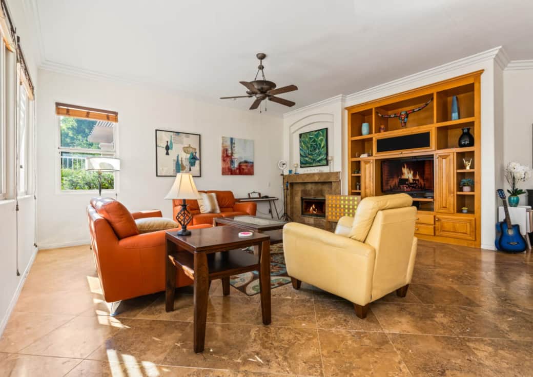 Gather and relax in this bright and comfortable living room, designed for both entertaining and unwi Gather and relax in this bright and comfortable living room, designed for both entertaining and unwi