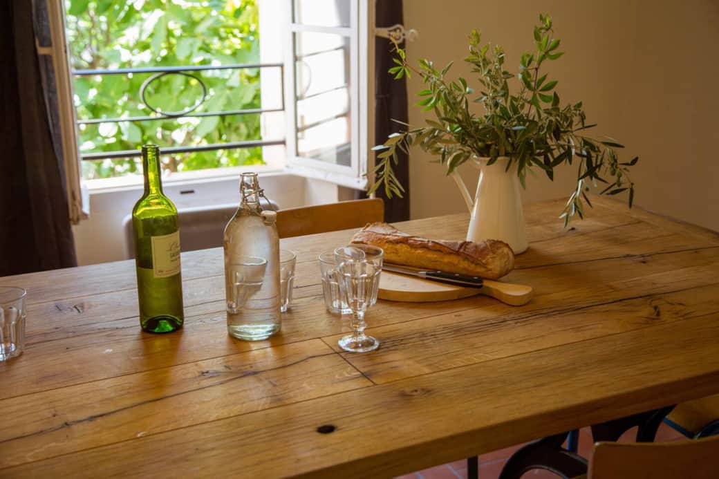 Dining room | The dining room has a big old oak table that seats 10, with two large windows that look out onto the village and the surrounding area.