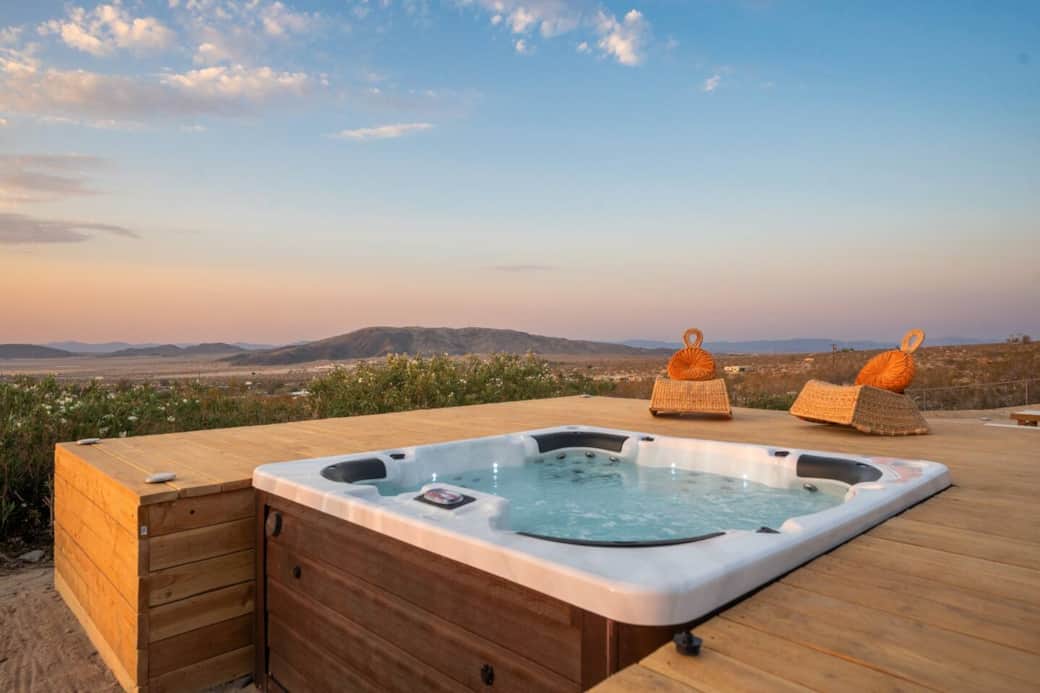 Unwind in our outdoor hot tub while enjoying breathtaking panoramic views. The deck is perfect for soaking up the sun by day and stargazing by night.
