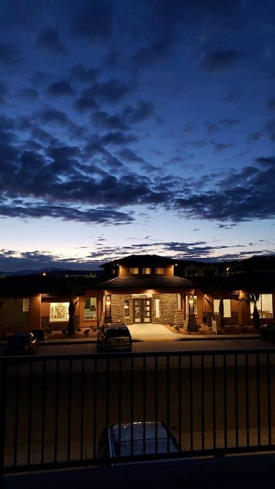 Beautiful SUNSET VIEW from the West facing 2nd Floor Covered Patio! Building shown is the Zion Village Clubhouse and overflow parking! Relax with your friends and family while you end your day. Club House is just a few steps away with street light. Beautiful SUNSET VIEW from the West facing 2nd Floor Covered Patio! Building shown is the Zion Village Clubhouse and overflow parking! Relax with your friends and family while you end your day. Club House is just a few steps away with street light.