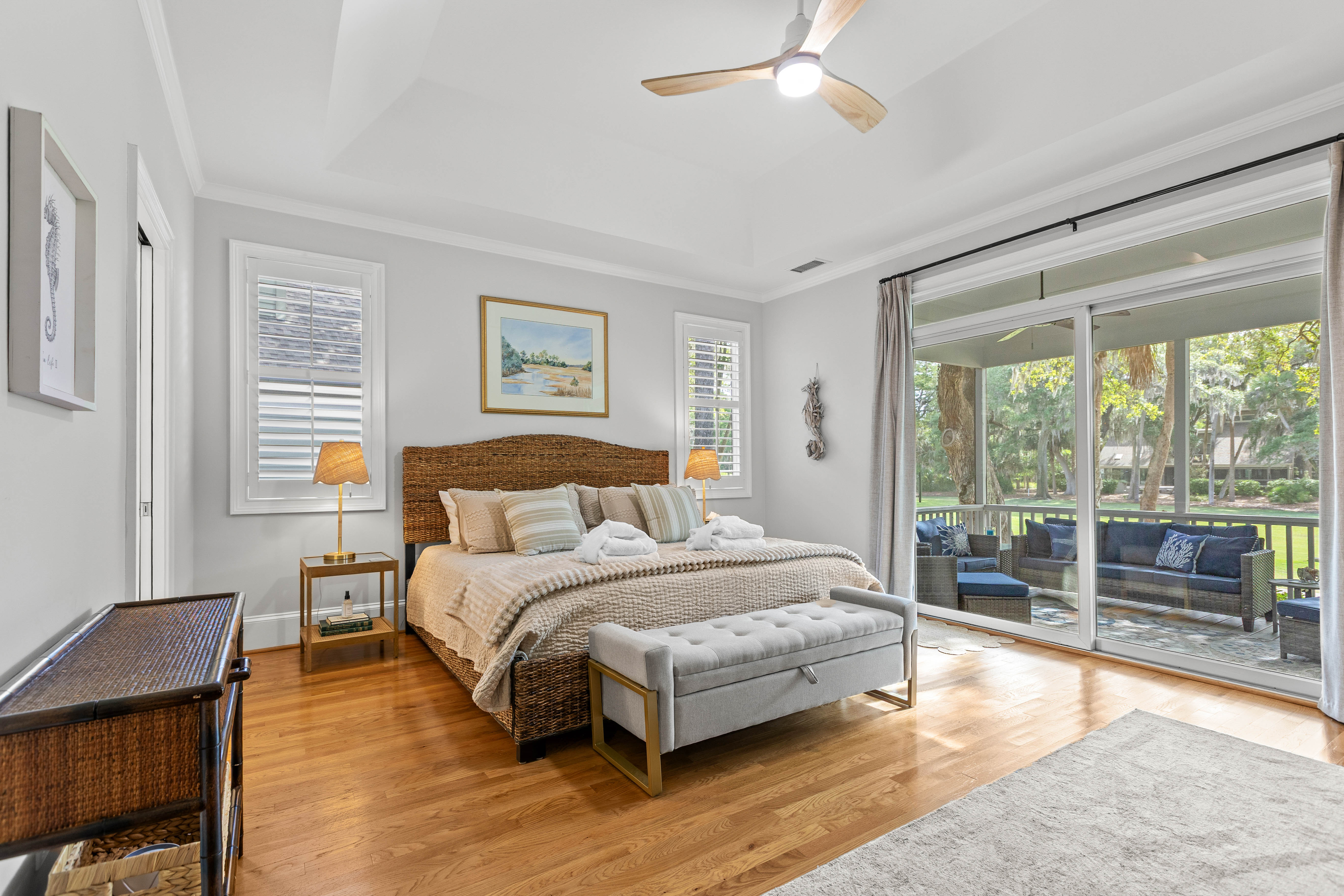 Sliding doors open straight onto the screened porch
