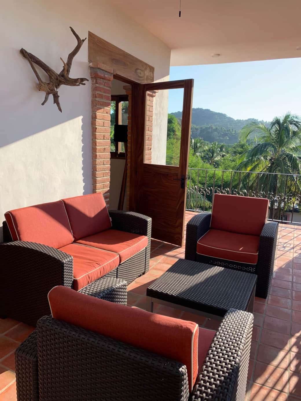 Second floor patio with ceiling fan