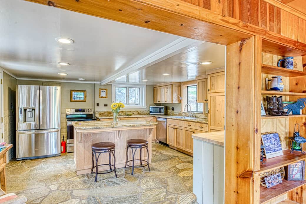 KITCHEN, SINKER CUSTOM MADE CABINETS, STONE FLOOR, STAINLESS STEEL APPLIANCES, LG DISHWASHER, LG FRIG WITH ICEMAKER, COFFEE STATION