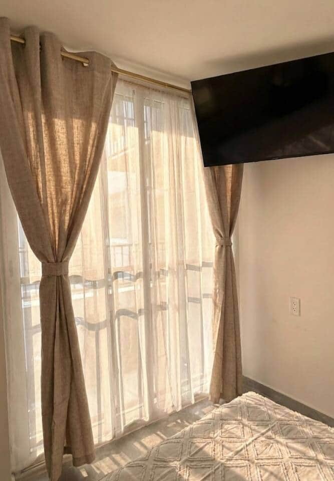 Kick back with a 32” Smart TV, wall-mounted for easy viewing—Netflix-ready for the perfect movie night. Close the curtains, get comfy, and enjoy your favorite shows after a day out. Kick back with a 32” Smart TV, wall-mounted for easy viewing—Netflix-ready for the perfect movie night. Close the curtains, get comfy, and enjoy your favorite shows after a day out.