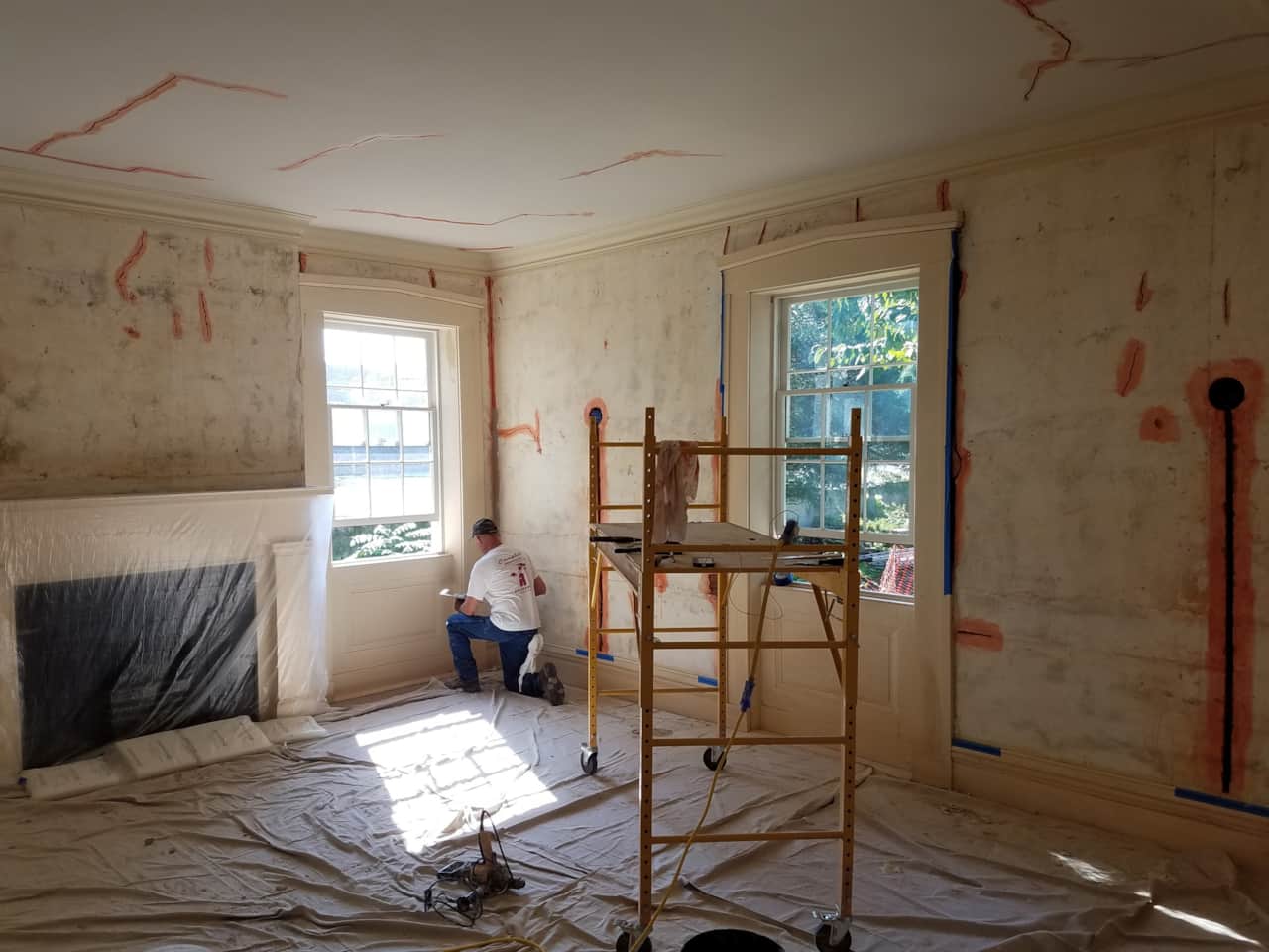 Jacob Campbell hard at work on plaster repair
