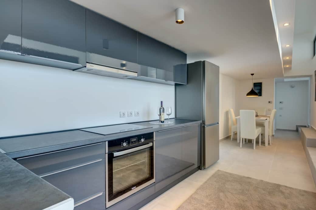 Kitchen and dining area Kitchen and dining area