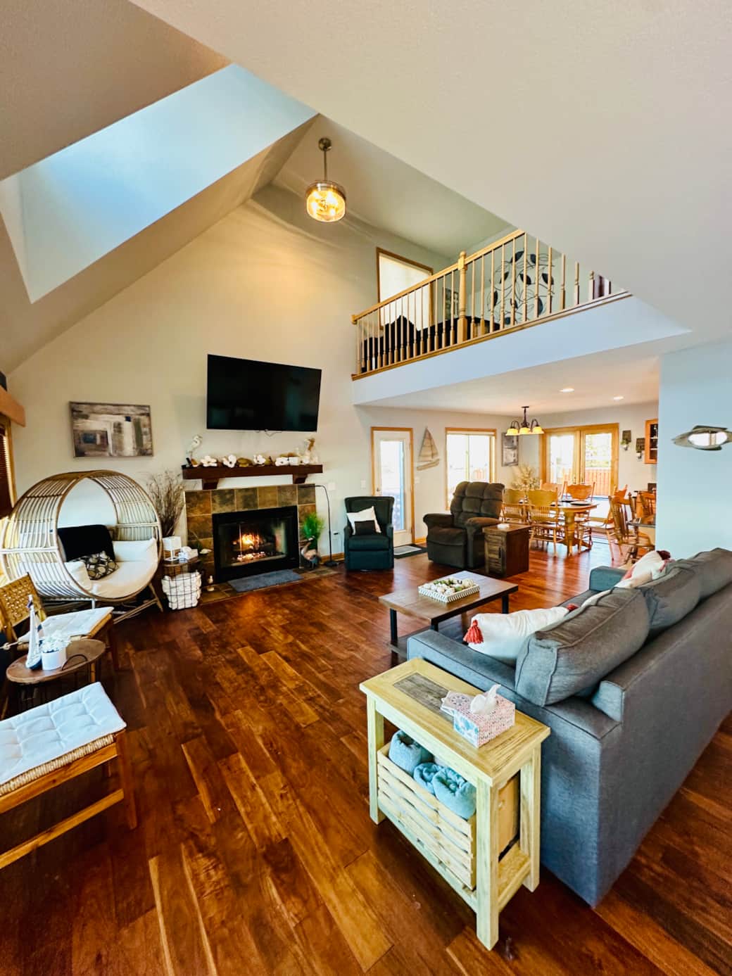 Unwind by the gas fireplace while watching TV on the new 65-inch Smart TV. Unwind by the gas fireplace while watching TV on the new 65-inch Smart TV.