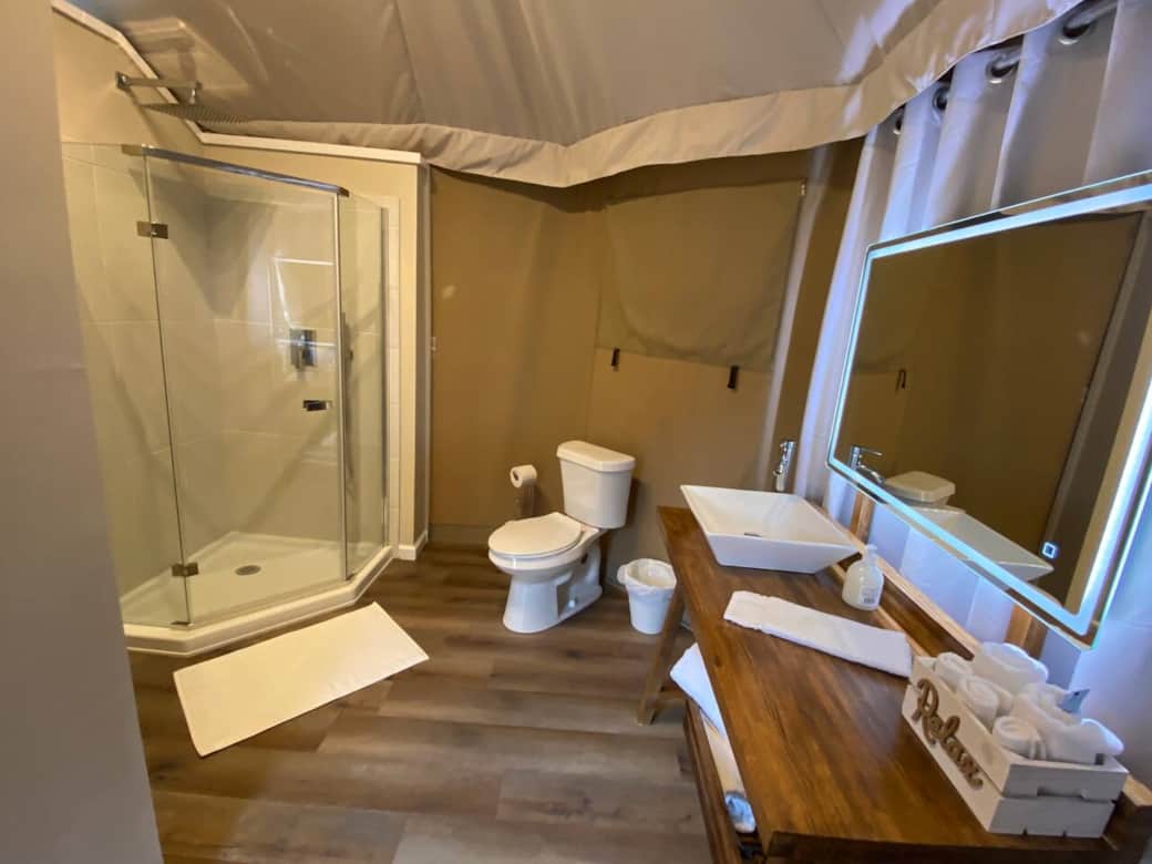Full bathroom includes rain head shower, lighted mirror and hair dryer.