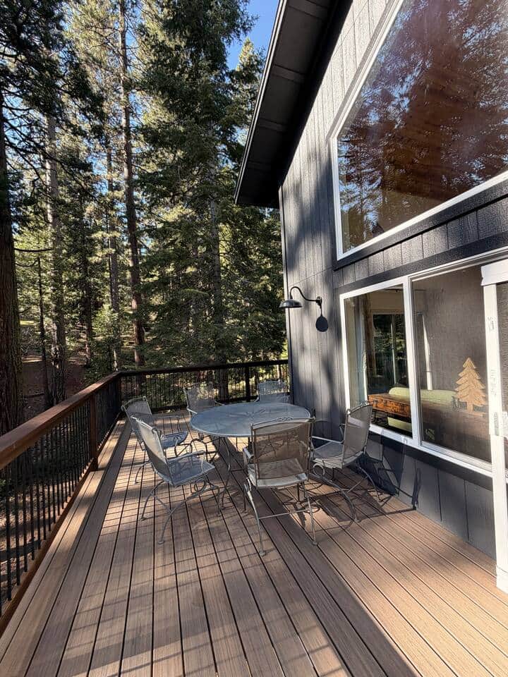 Brand-new wraparound deck with BBQ, dining table and chairs, lounge chair. Perfect for morning coffee, al fresco meals, or relaxing in comfort while enjoying forest views and fresh mountain air.