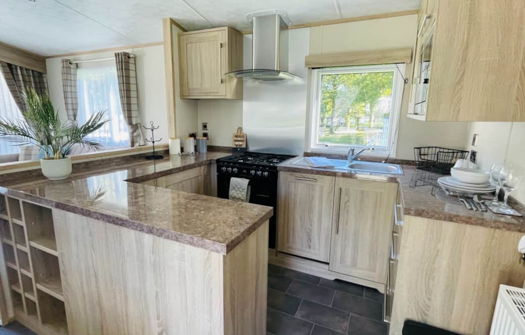 Full kitchen in the daylight.