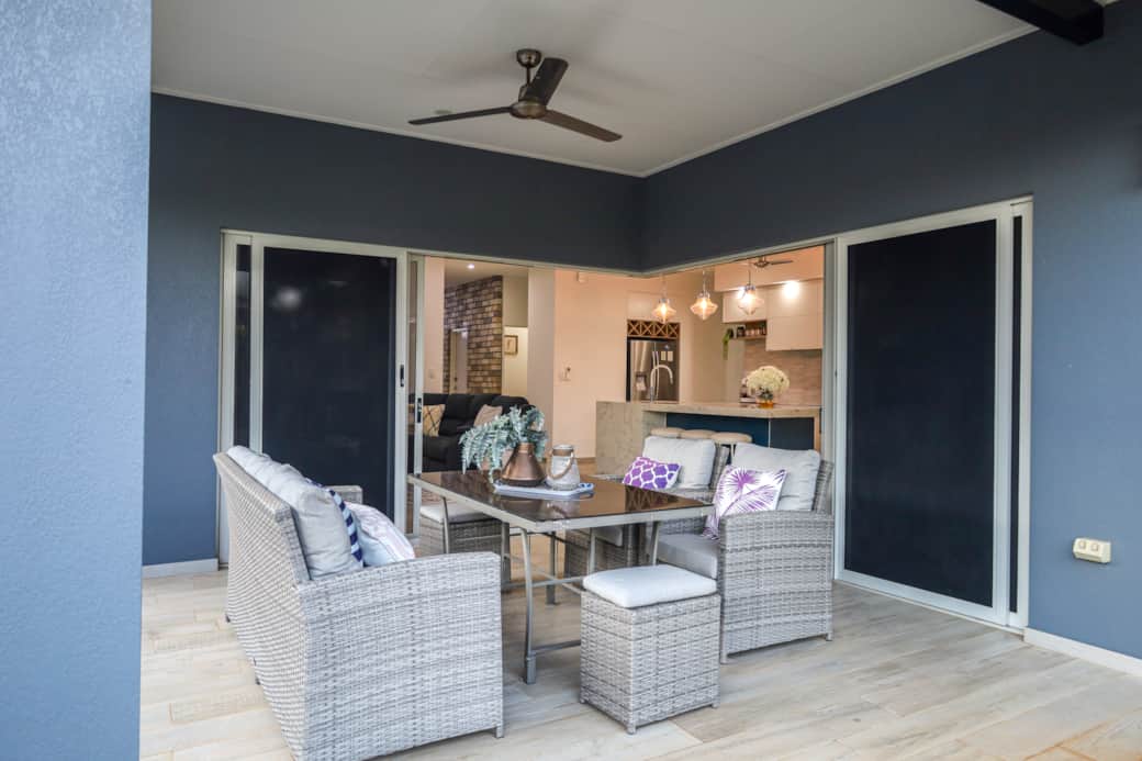 Spacious back veranda with outdoor dining and BBQ—ideal for relaxed meals and alfresco entertaining.